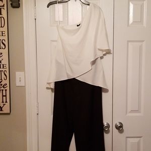 One shoulder cream and black jumpsuit